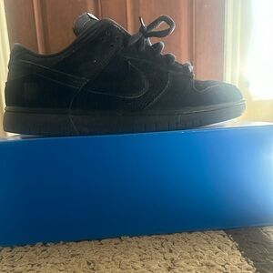 Undefeated Nike Dunk Low Sneakers